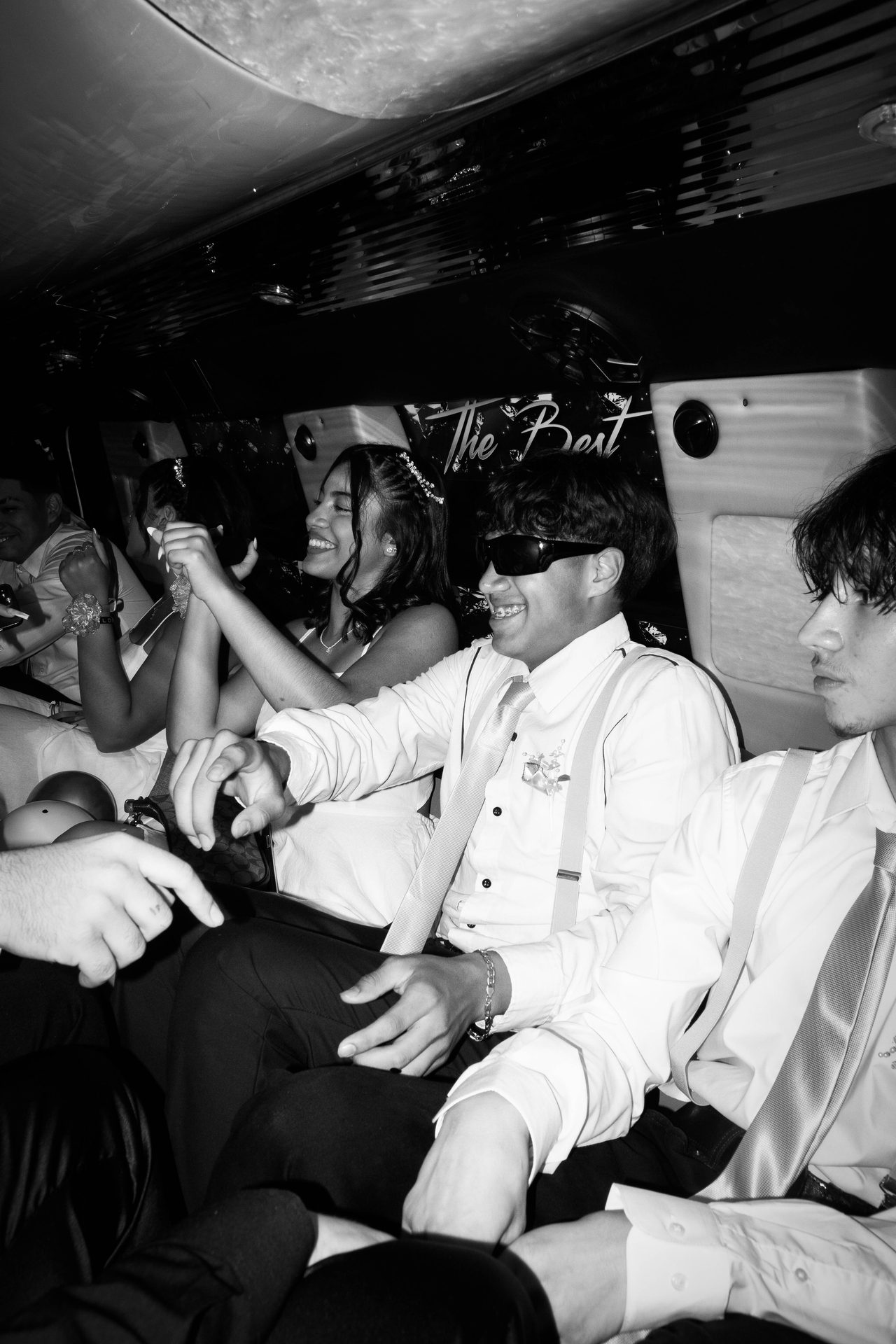 Limo party celebration, candid black and white event photography Dallas Fort Worth